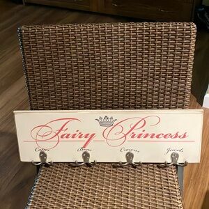 A Fairy Princess sign with hooks to hang accessories